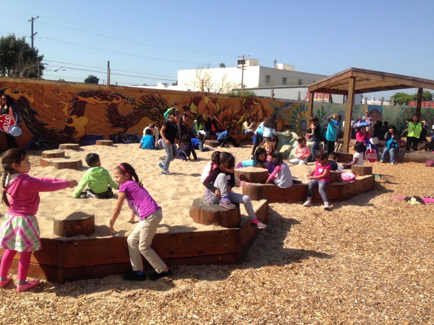 A number of children play in Pogo Park in San Francisco, California