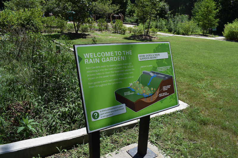 A green sign that says, 