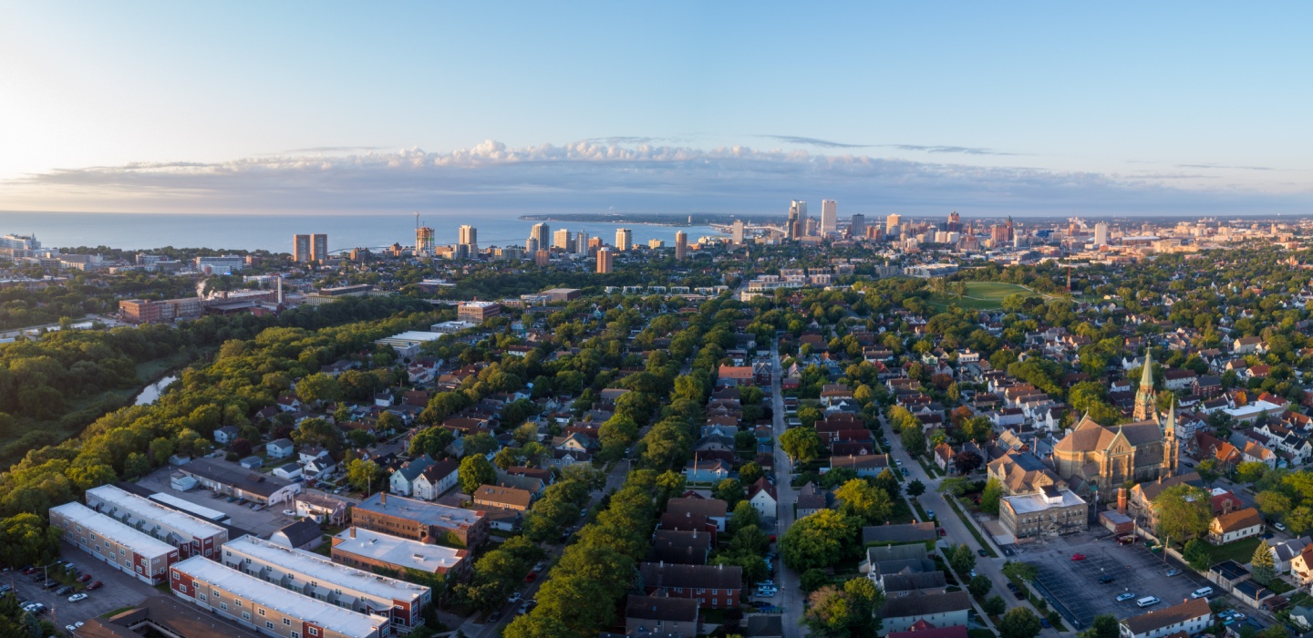 An aerial photograph of Milwaukee, with trees scattered about tall buildings