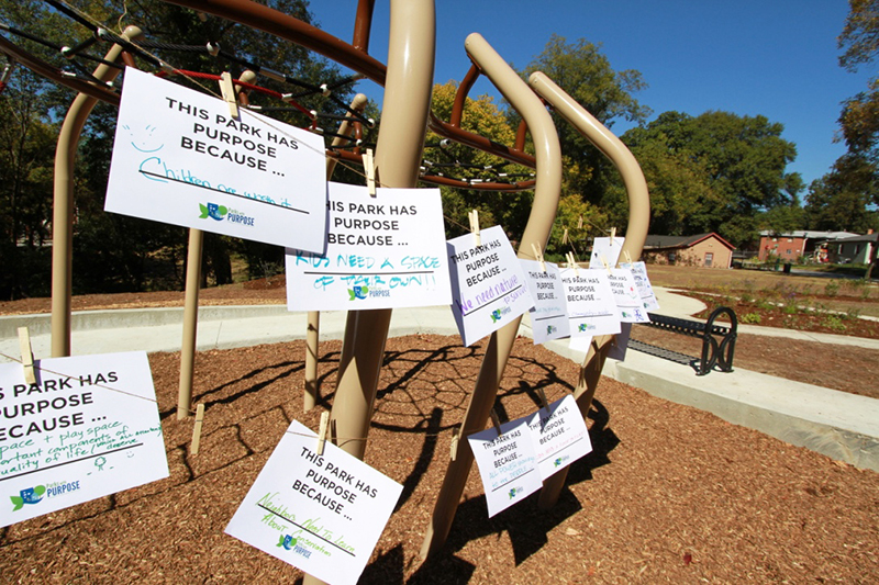 #ParksWithPurpose signs at the ribbon cutting.