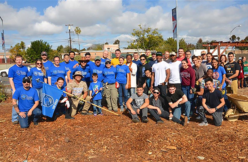Group shot of volunteers at Mt. Hope Community Garden, Dr. Martin Luther King Jr. Community Workday, 2016. Photo credit: Eder Escamilla. 