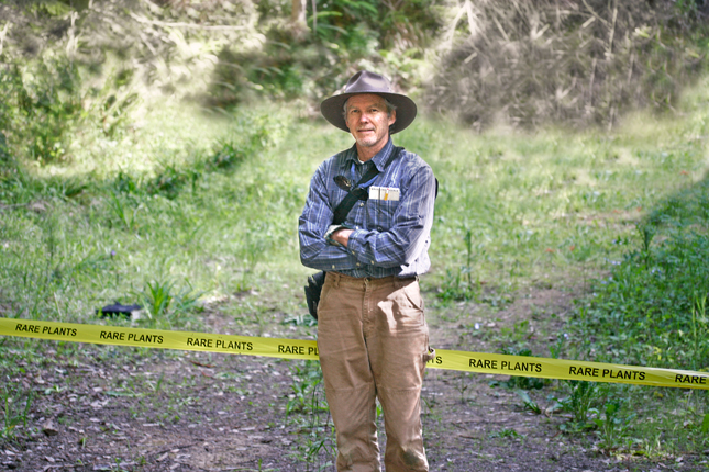 Botanist Kerry Heise stands in front of the location where he and Geri Hulse-Stephen found the patch of the endangered Monterrey clover in Big River Forest. This was the first finding of this globally imperiled plant since 1995. Photo by Geri Hulse-Stephen. 