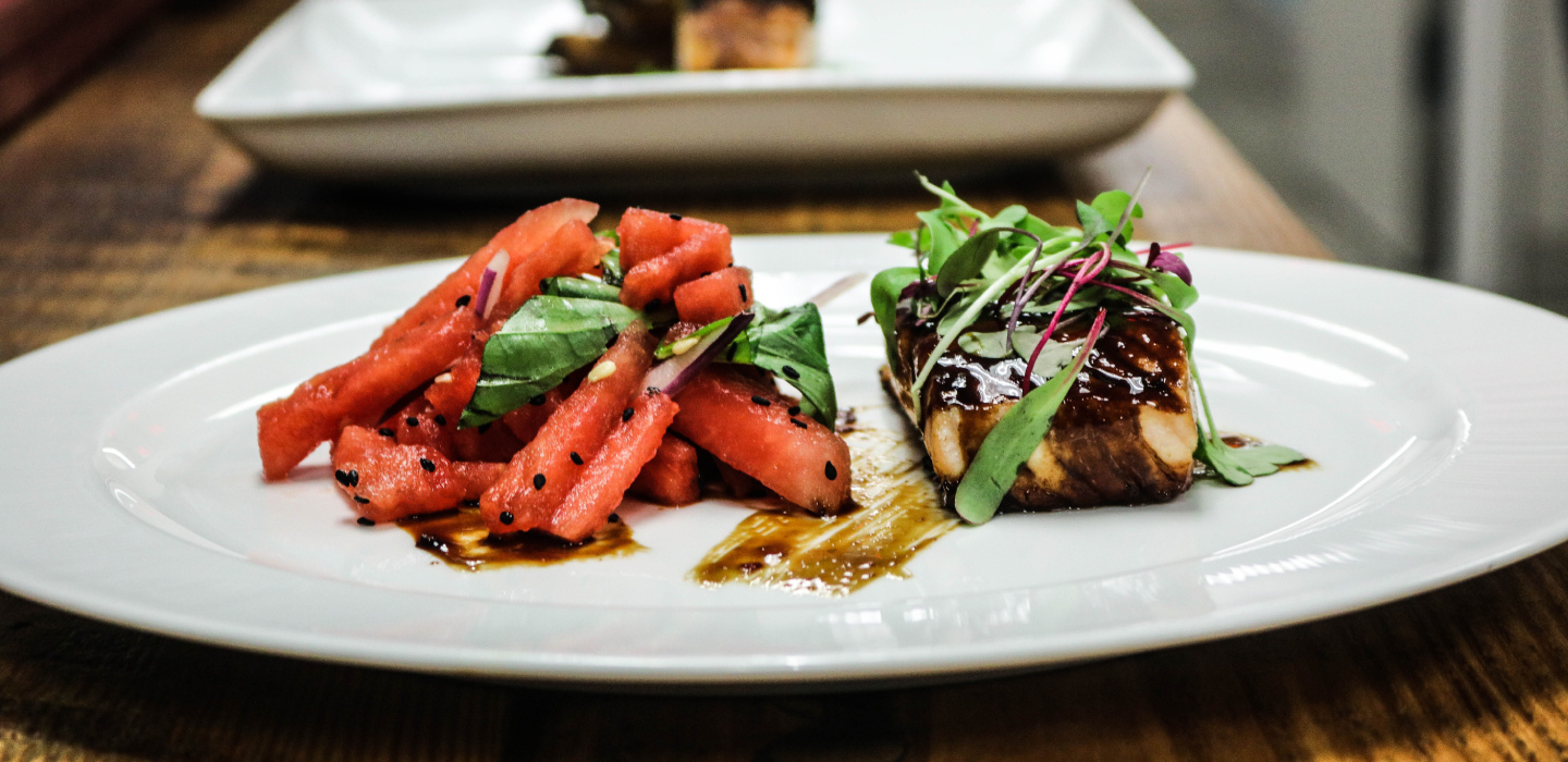 Salmon entrees on a white plate