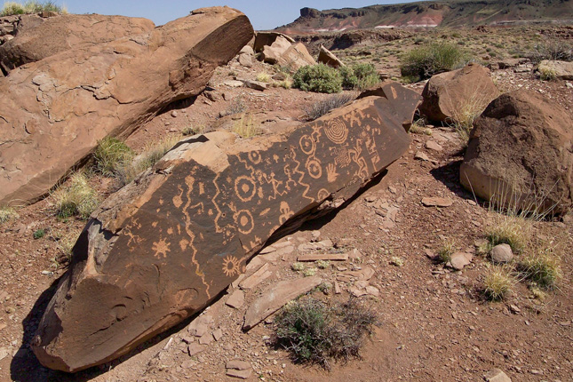 Petroglyphs At Petrified Forest National Park Photo courtesy National Park Service  Over 13,000 years of human history and culture can be found at Petrified Forest National Park. The petroglyphs found throughout the park generally are attributed to the 