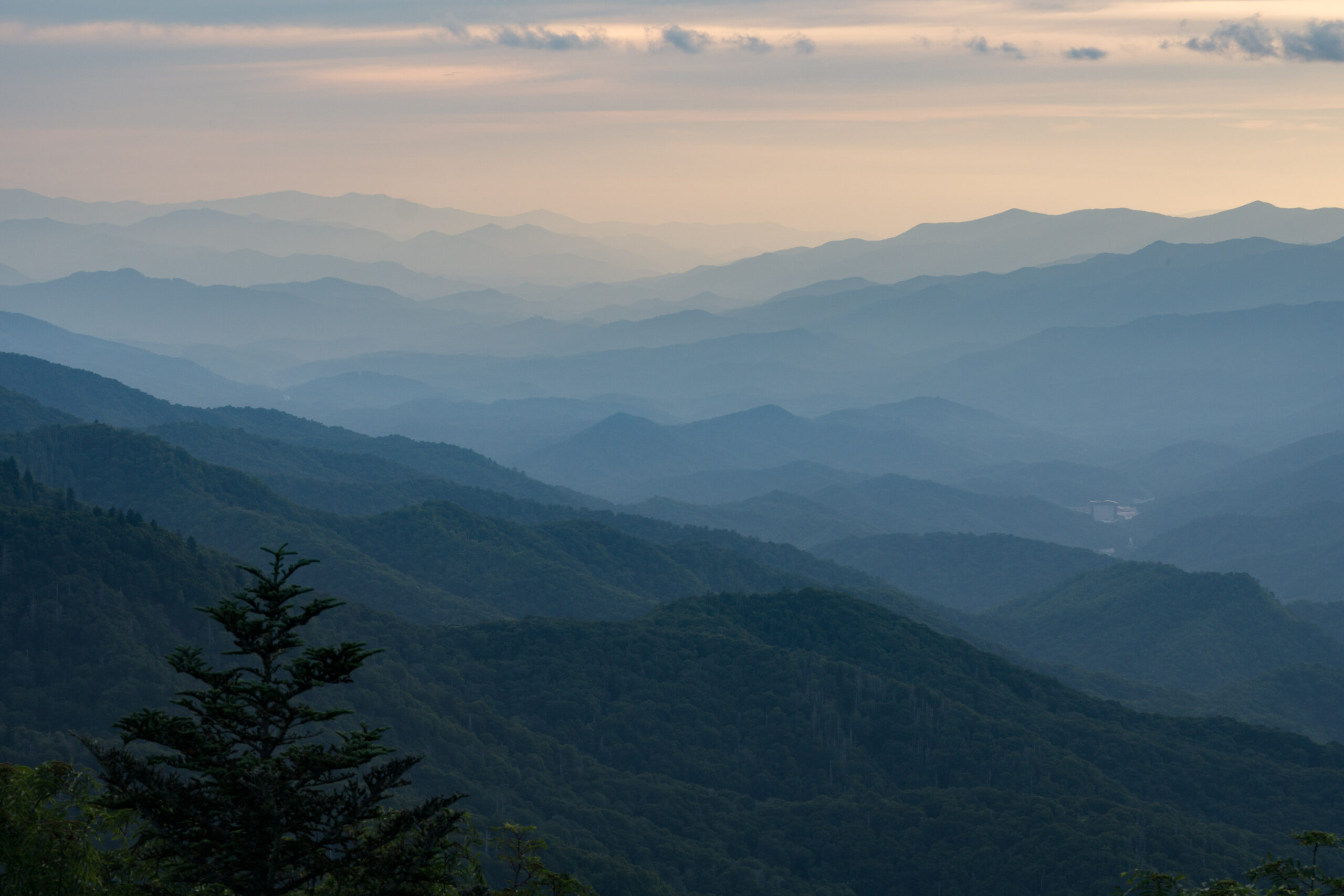 A mountain landscape at dusk.