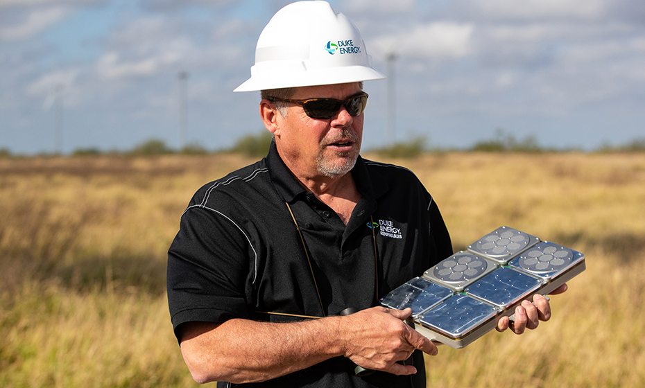 Tim Hayes working a Duke Energy renewable energy site in his role as environmental development director.