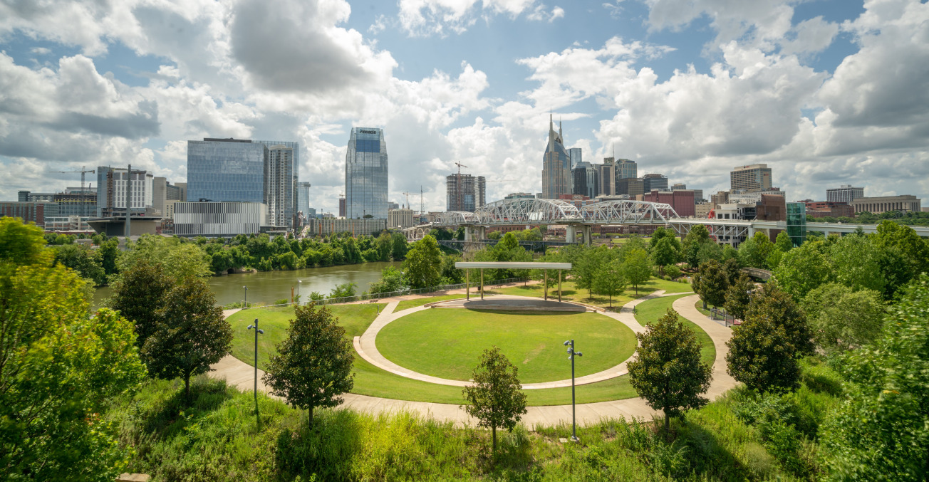 View of Nashville skyline from Beaman Park, showcasing the Highland Rim's natural beauty and urban landscape.